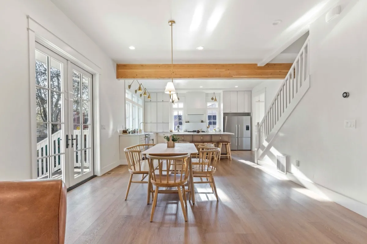 Craftsman-style kitchen and dining space with warm wood tones