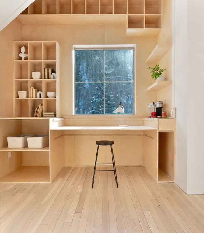 Built-in breakfast nook with a curved upholstered bench