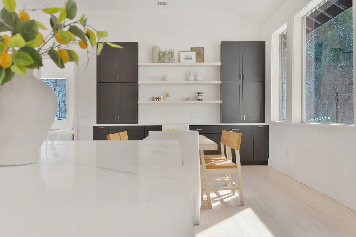 Remodeled kitchen dining nook with built-in bench seating